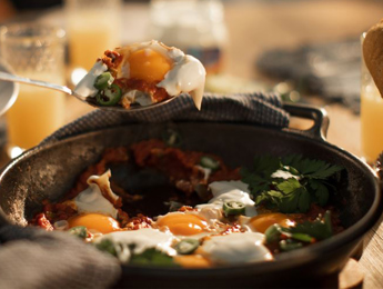 Shakshuka with Cream Cheese Spread and Baguette