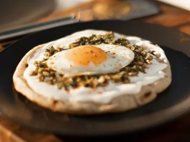 Fried Egg on Pita Bread with Green Olive Paste and Cream Cheese Spread